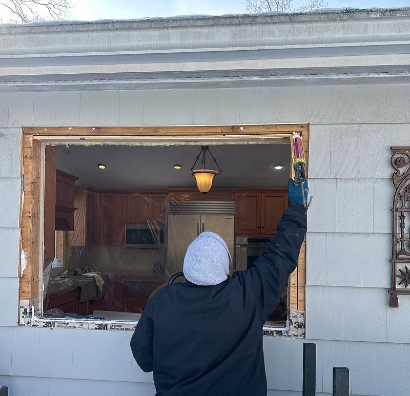 Applying sealant before window installation